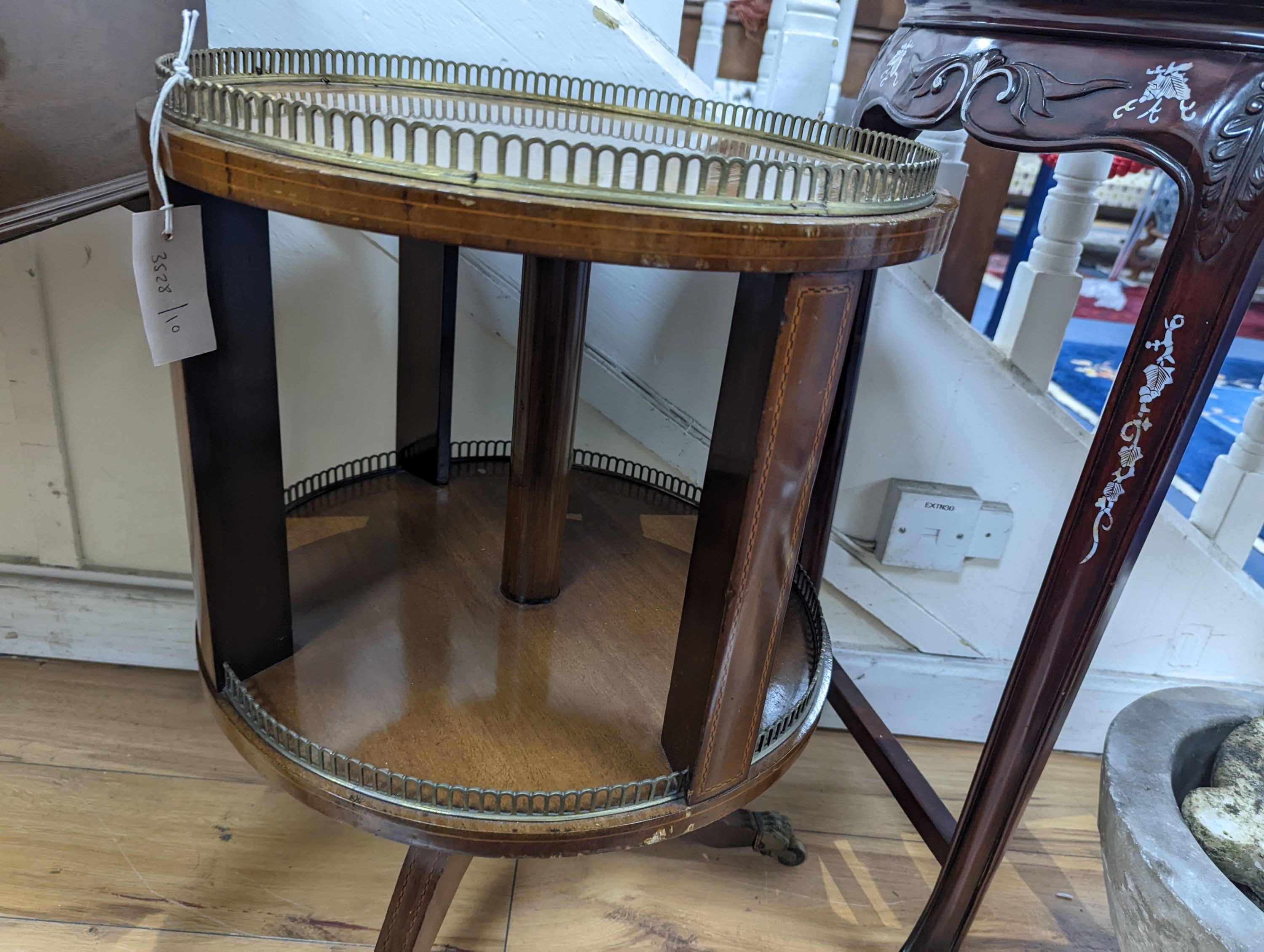 A Regency style circular mahogany revolving galleried bookcase, diameter 45cm, height 65cm